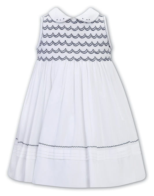 Sarah Louise Girls Smocked Sleeveless White and Navy Dress